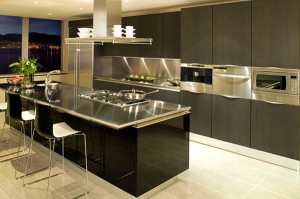 modern-kitchen-design-ideas-stainless-steel-countertops-black-cabinets